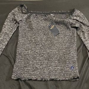 Off the shoulder ruffle shirt